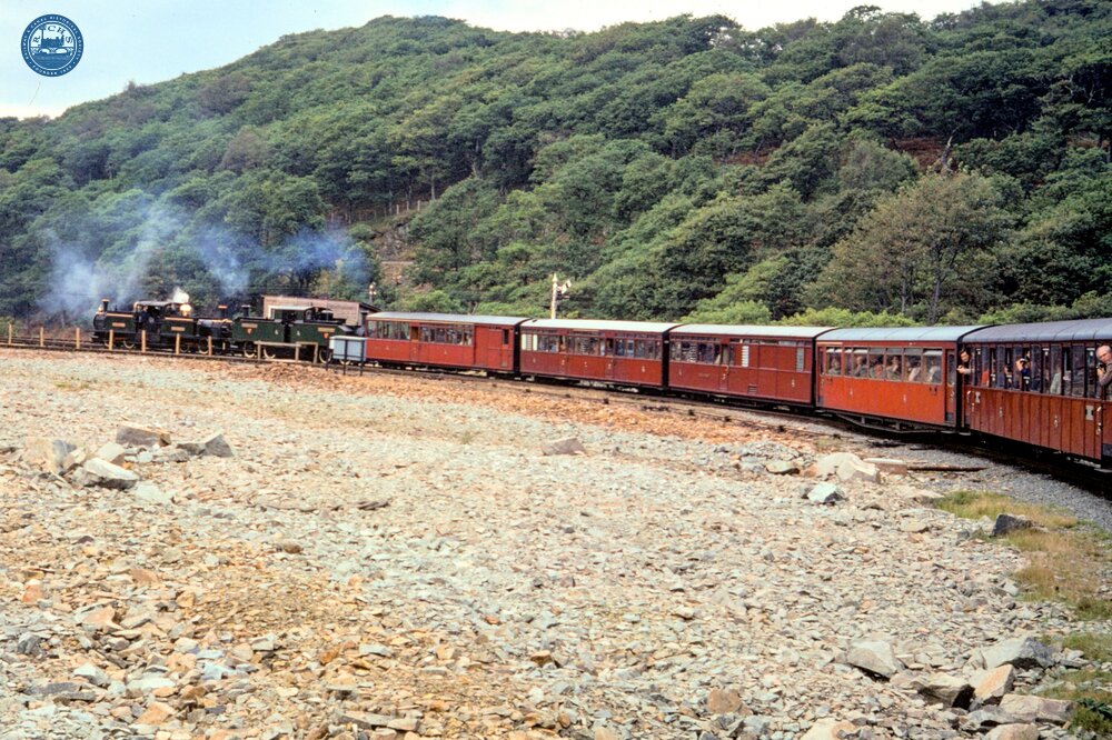 Ffestiniog Railway. Ddualt. Train hauled by two Fairlie locos on the spiral. 13 October 1979