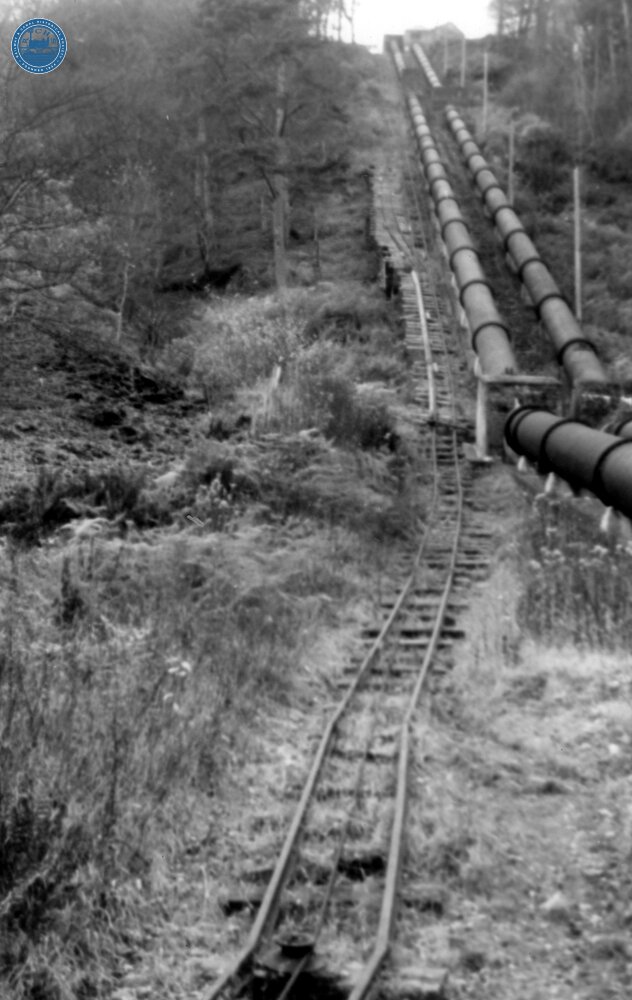 Llyn Cowlyd Tramway. Part way up the incline, where the railway and pipelines are parallel. 08 December 1963