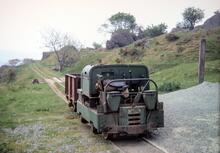 Llyn Cowlyd Tramway. Motor Rail 'Simplex' tractor, No.22154 of 1962 (later named “Dolgarrog”) + wagon at the terminus. 24 May 1968