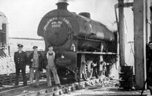 Guard Arthur Millward, Driver Sam Buckley and Fireman Dennis Vallance in front of J94 No.68012 before leaving with the last scheduled train from Middleton Top on the Cromford & High Peak Railway. 21 April 1967