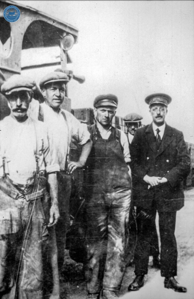 Leonard Cope, Station Master at Longcliffe, Cromford & High Peak Railway, with the yard staff, sometime about 1930.
