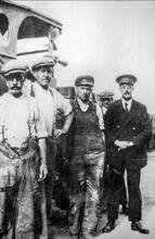 Leonard Cope, Station Master at Longcliffe, Cromford & High Peak Railway, with the yard staff, sometime about 1930.