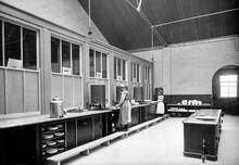 LNWR Crewe. Serving counters and staff preparing for service in workmen's canteen 19 July 1918. (Ref: 030797)