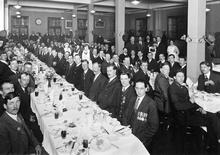 An assembly of LSWR staff enjoying a meal after the opening of the new Waterloo station - 1922. (Ref: 030992)