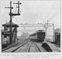 017334 Photograph LB&SCR . Electric traion on crosspver road at Peckham Rye looking towards Queen's Road Peckham. South London stocccck