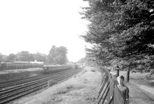 325093E  C1_11SR EMU with 2 trains passing Tooting Lido. 