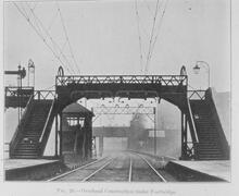 017314 Wandsworth Rd Station (ATL @ 6m 52ch) overhead construction under footbridge