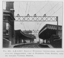 017645 Battersea Park Station (ATL @ 7m 35ch). 017645E E_98 Photograph LB&SCR electrification overhead construction showing pull-off arrangement at Batersea Park station, oooking towards Victoria