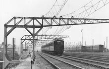 Near Clapham Junction c.1920s. Cantilevered Overhead Catenaries. (VTB1 c.2m ) (Ref:031098)