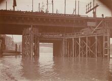 Cannon Street Bridge over the River Thames (CBM @ 0m 16ch). Detail of timber supports in the river.  Possibly taken around 1899 during the widening (Ref: 030679)