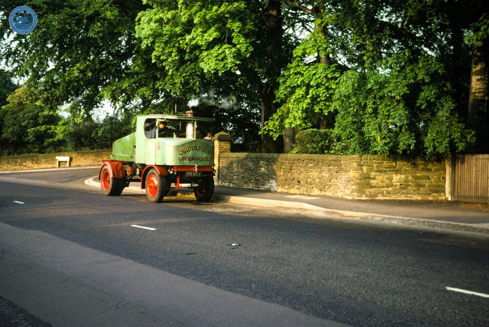 112977E