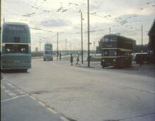 Passengers changing from defective Teesside trolleybus outside Cargo Fleet depot. 13 May 1968