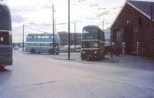 Passengers changing from defective Teesside trolleybus outside Cargo Fleet depot. CPY287, Fleet No 16 on right. 13 May 1968