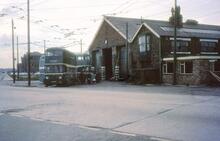 Passengers boarding Teesside Railless Traction Board trolleybus CPY287, Fleet No 16 from defective trolleybus outside Cargo Fleet depot. on right. 13 May 1968