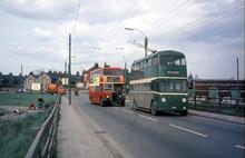 United Automobile Services motor-bus PHN824, and Teesside Railless Traction Board trolleybus GAK11 (Fleet No 1) in Middlesbrough Road, South Bank. 13 May 1968