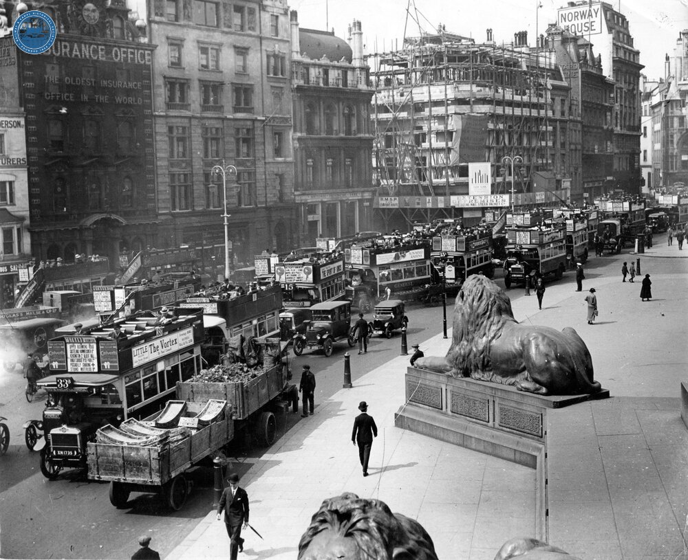 London: 1922 Image of the South side of Trafalgar Square with a selection of mostly London General omnibuses. (Ref: 031593)