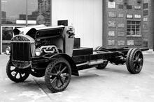 Tilling Stevens petrol electric motor bus chassis with engine cowling open from 1923.(Ref: 031574)
